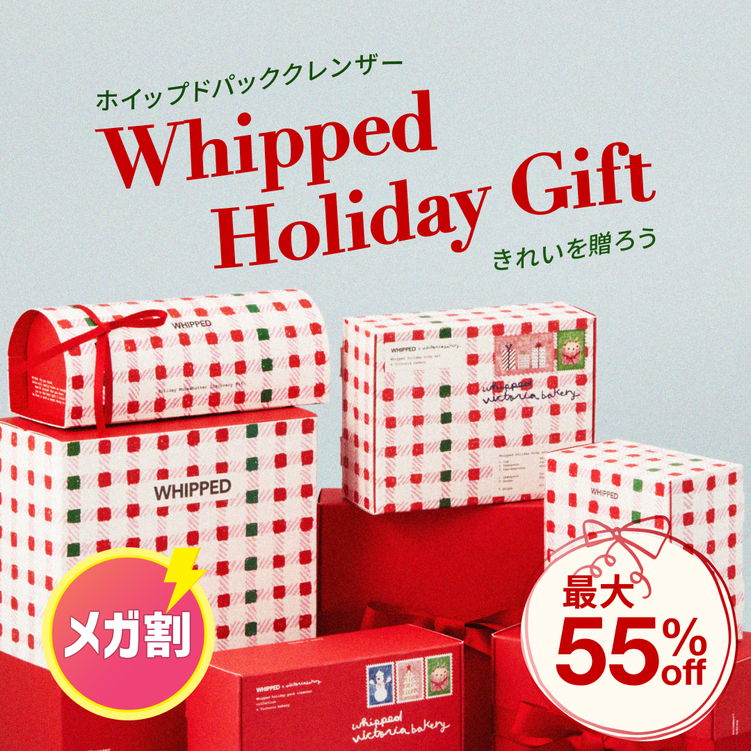 Graphic of a typography specimen showing the alphabet and numerals on top of a dark gray background.